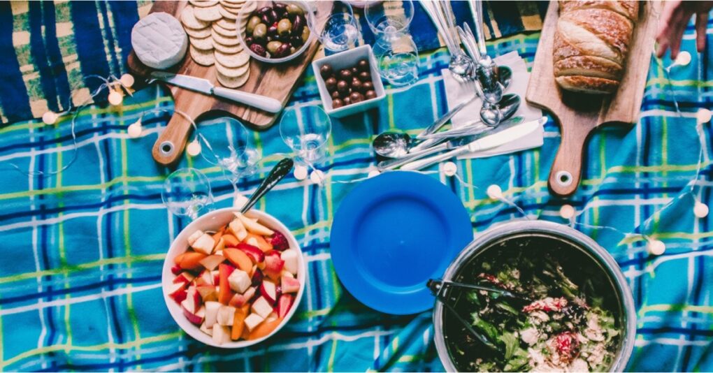 A table with food and plates on it