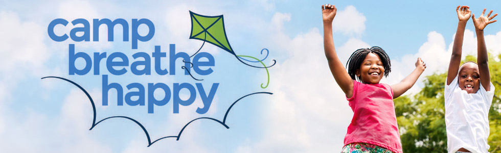 A person flying a kite in the sky with the words " the happy ".