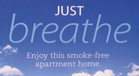 A poster with the words " just breathe " on it.