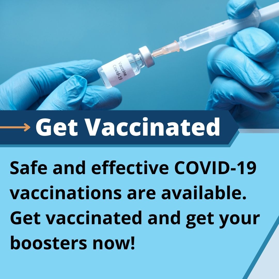 A person is holding a syringe with text that says " get vaccinated ".